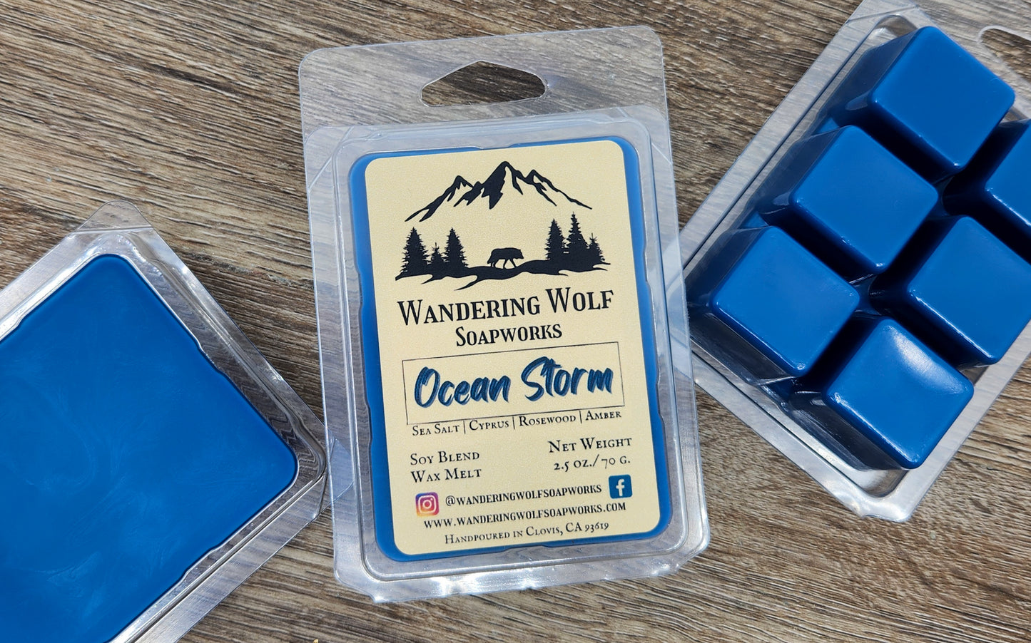 Wandering Wolf Soapworks Ocean Storm wax melts on a wooden surface